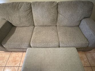 Three seat couch and leg rest