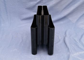 Vintage Kartell magazine rack.