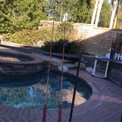 TWO (2) Custom Wrapped Calstar Or Sabre 7’1” Satwater Spinning Rods For 15-40lb(my estimation)