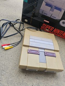 Super Nintendo Entertainment System - Original in box with 8 games