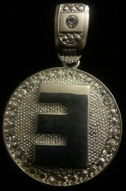 Eminem E spinner and his other stainless steel pendants. I will include a free chain with each pendant purchased. Brand New ONLY $30.