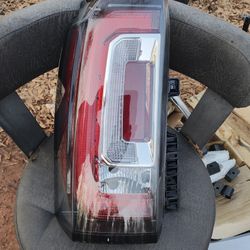 Driver Side Tail Light For A 2015 To 2020 GMC Yukon OEM Part