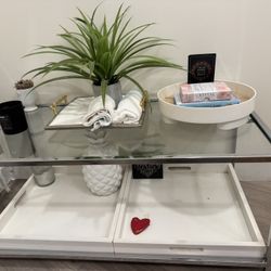 Glass coffee table with pull out white trays 