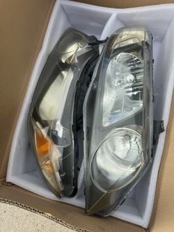 OEM 2006-2011 Civic 4D Headlights