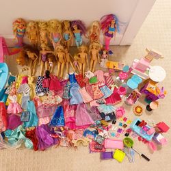 Huge Lot of Barbie’s & Accessories, Clothes Etc .. 