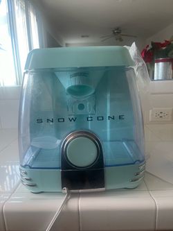 Snow cone ice machine