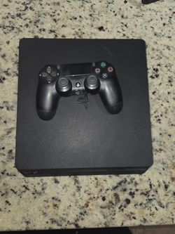 PS4 slim with controller