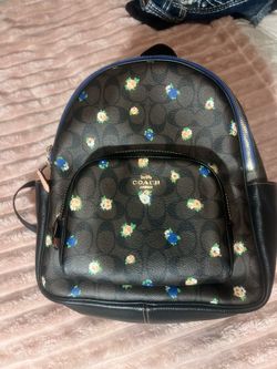 Real floral Coach backpack