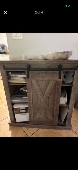 Accent cabinet with rolling door
