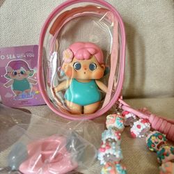 HOT QOQO figure in clear display bag with key chain