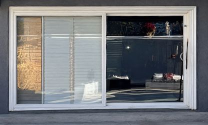 White Sliding Glass Door & White Wooden Shutters