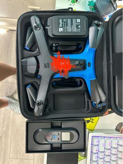 Skydio 2 with hard shell case, one battery and the Beacon remote