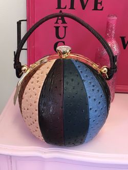 Multi-color leather purse.. Designer Ashley Milan