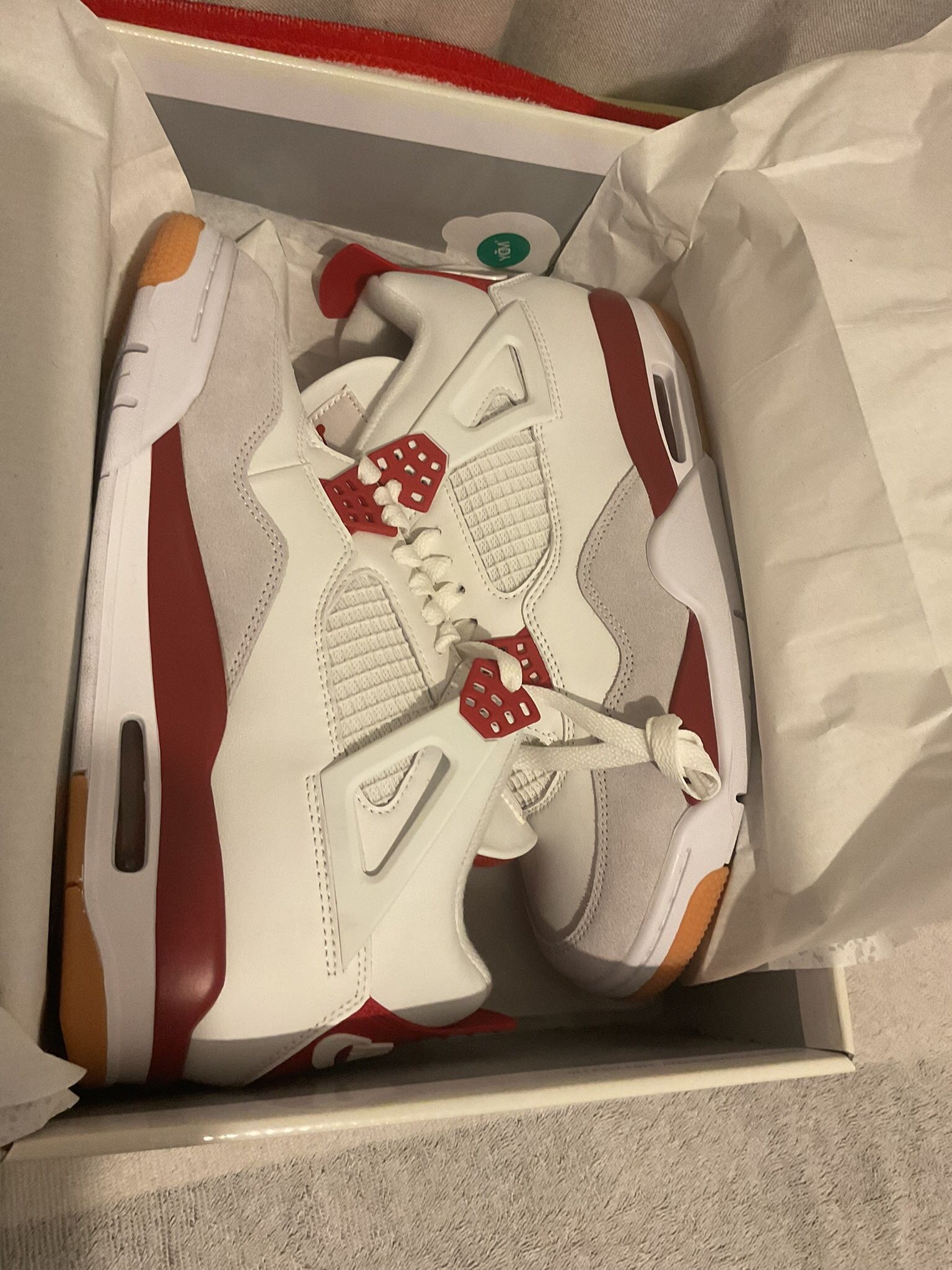 Jordan 4s SB Varsity Red