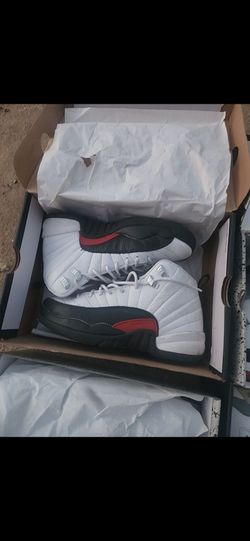 Jordan 12 Retro white sneakers with red accents #basketball #retro