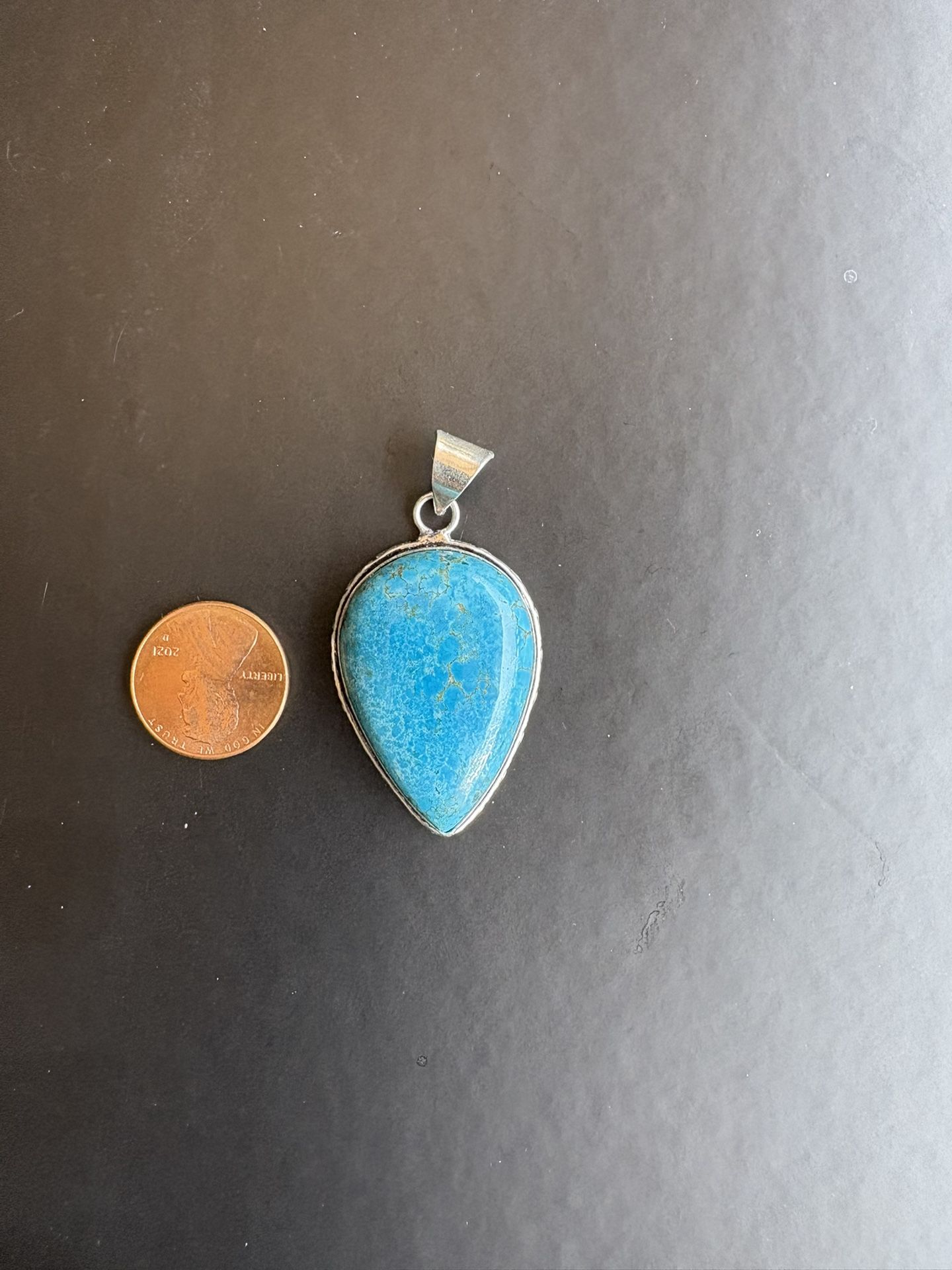 Turquoise And Silver Pendant