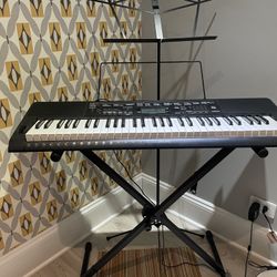 Casio Keyboard And Music Stand 