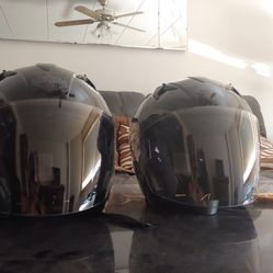 Two new Harley Davidson helmets with cloth cases