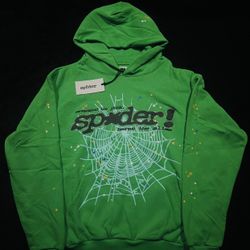 Spider Worldwide green hoodie with white spiderweb graphic and crystal stones around words #spiderworldwide