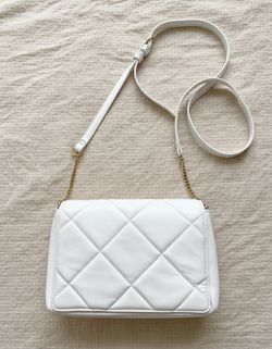 Women’s hand bag with adjustable strap