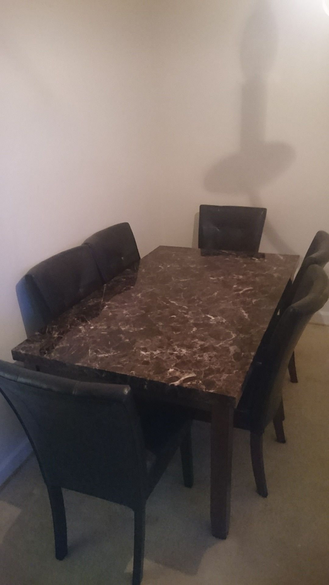 Faux marble dining room table $550