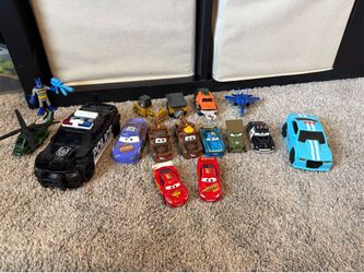 Little boy toys: police car, Disney movie Cars, airplane