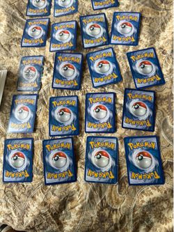 A Pokemon card holder and the cards inside of it