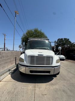 2009 freightliner w/roll off
