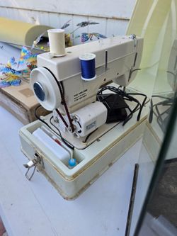 Dress maker sewing machine