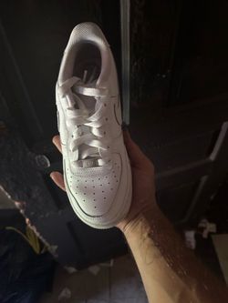 All white low top Air Force’s
