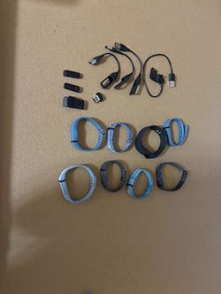 Fitness Tracker Bands and Charging Cables Lot