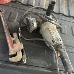 Angle Grinders And Pipe Wrench 
