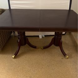Dark Brown Dining Table With Brass Capped Feet