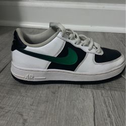 Green And Black Nike Shoe