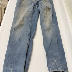 Worn but clean and wearable blue jeans, size 30. 