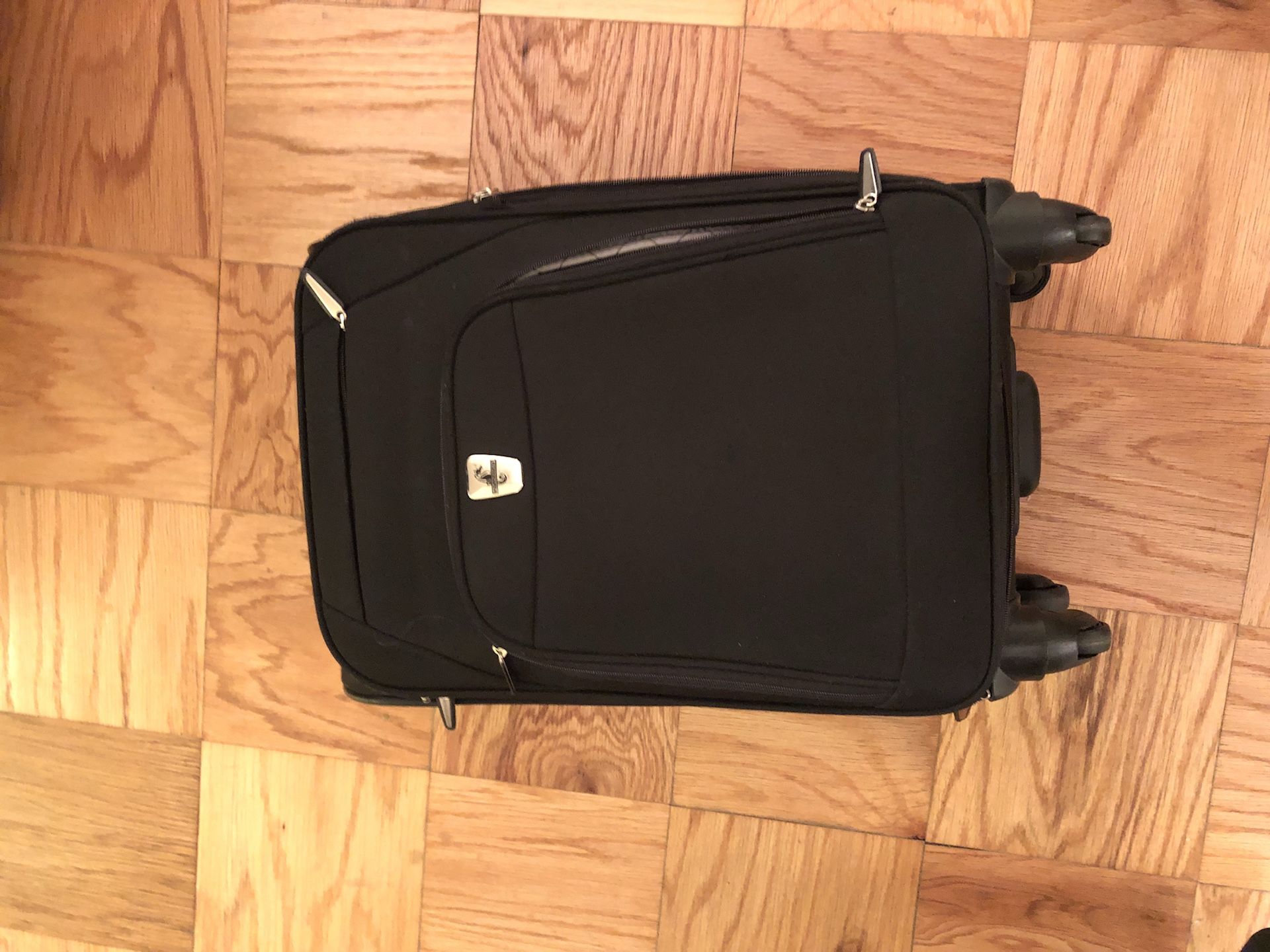 Luggage: Black carry on spinner suitcase