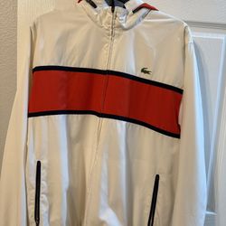 Lacoste Sport Zip Jacket in white with a red and navy blue stripe. 