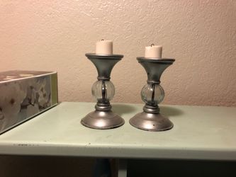 Two matching candle holders