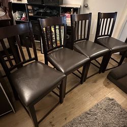 Set of four (4) espresso brown padded kitchen table chairs