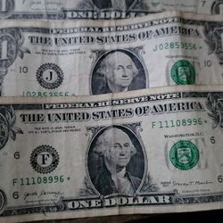 For collectors of one-dollar bills with a star, how much are you offering for these three bills?