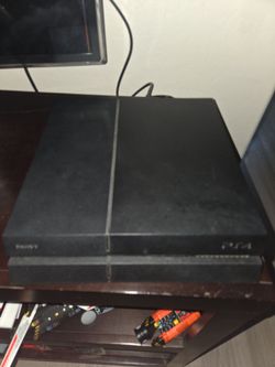 Ps4 with hard drive, 2 controllers, hard drive, and 4 games