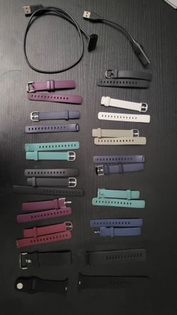 FitBit wristbands + 2 chargers and 1 apple wristband