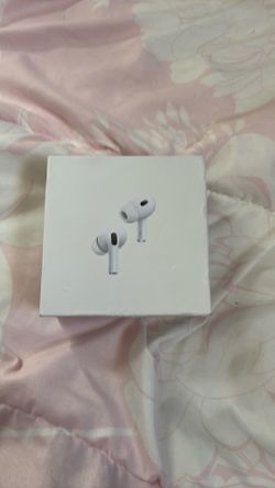AirPod Pros opened to take pictures