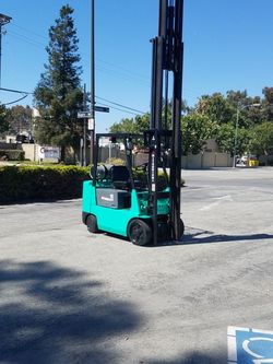Mitsubishi Forklift 5000 lb capacity 3 stage side shift runs good no mechanical Problems� This forklift has been well maintained ready to go to work