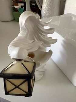 White Figurine Lights Up -New