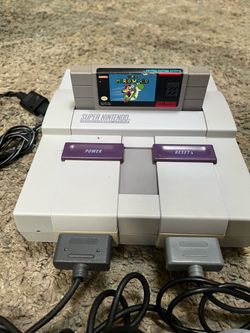 Super Nintendo with Mario world and 2 controllers