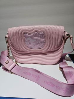 Danielle Nicole quilted crossbody bag  Hello Kitty embossed design .