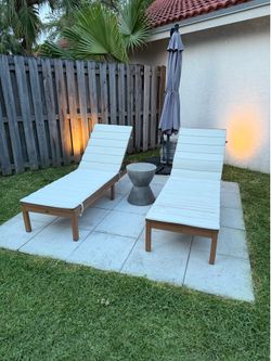 Pair of chaise lounge chairs
