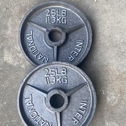Pair Of Olympic 25 LB Plates 2” Hole 