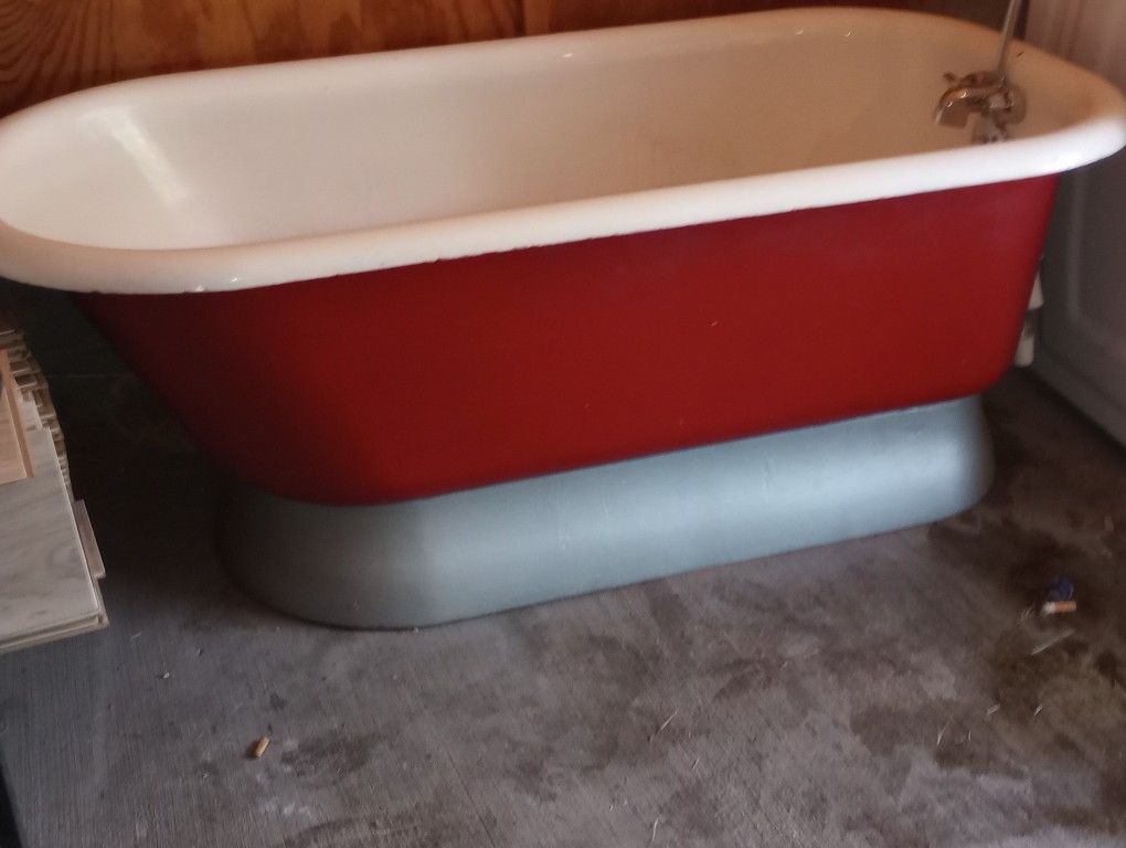 Pedistool Cast iron Tub With Wrap Around Shower Unit That Retails For $350 Alone